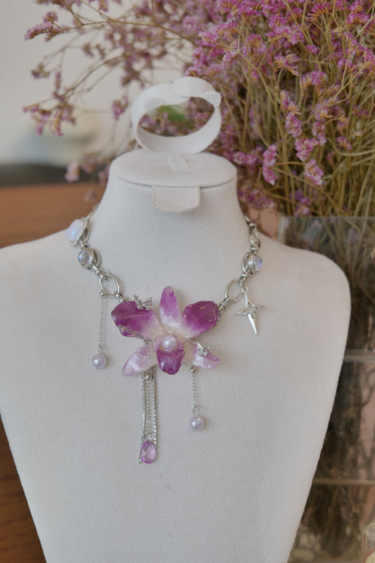 front view of purple Dendrobium orchid pearl charm choker necklace, handmade botanical jewellery by Terra Decode