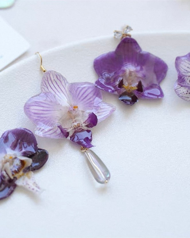 Orchid drop earrings with preserved flower resin petals by Terra Decode