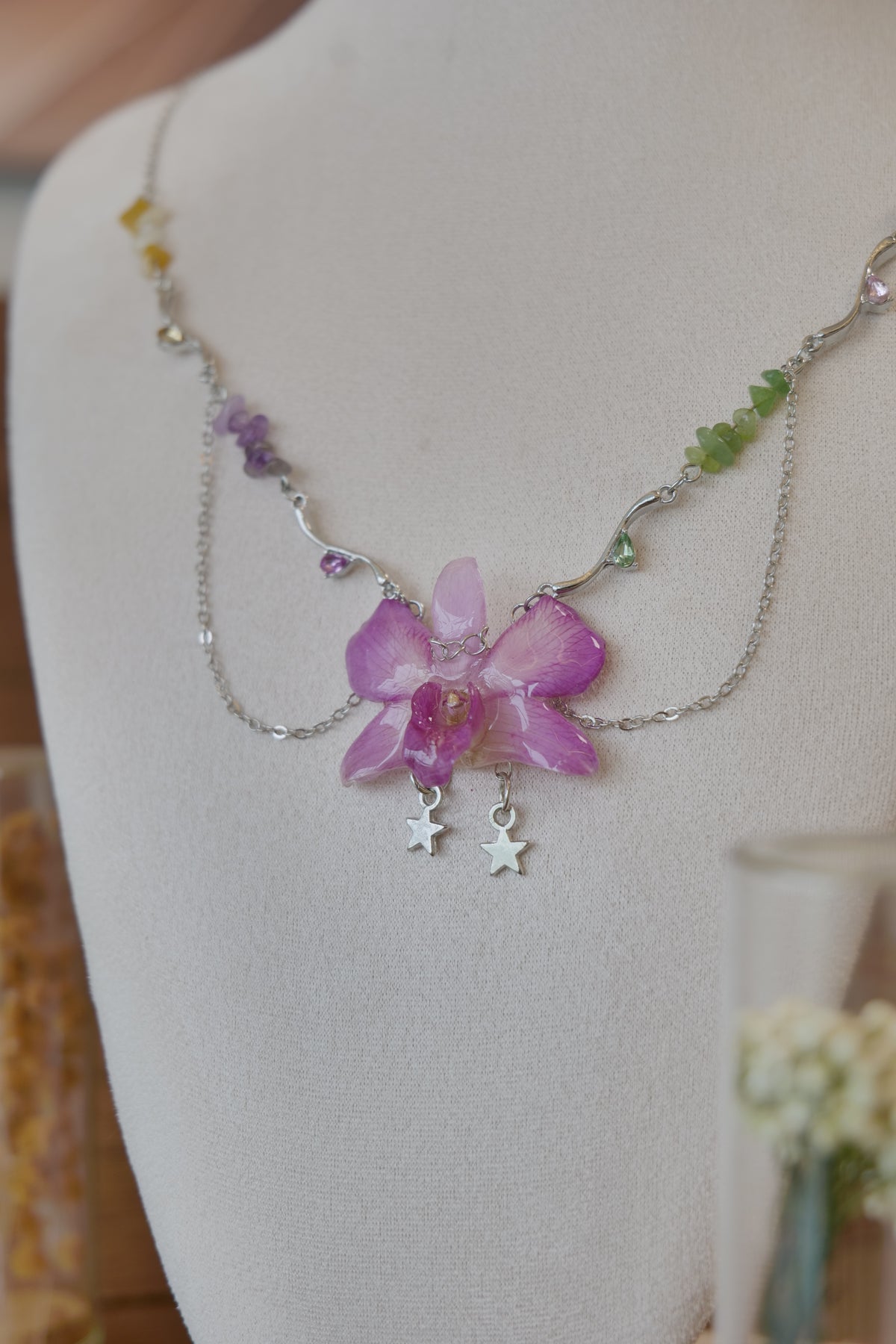 botanical detail of purple Dendrobium orchid beaded charm necklace, handmade botanical jewellery by Terra Decode