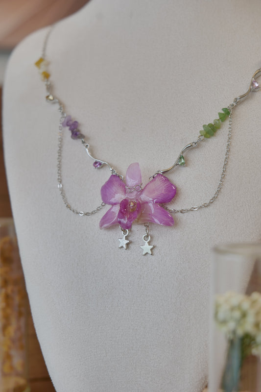 botanical detail of purple Dendrobium orchid beaded charm necklace, handmade botanical jewellery by Terra Decode