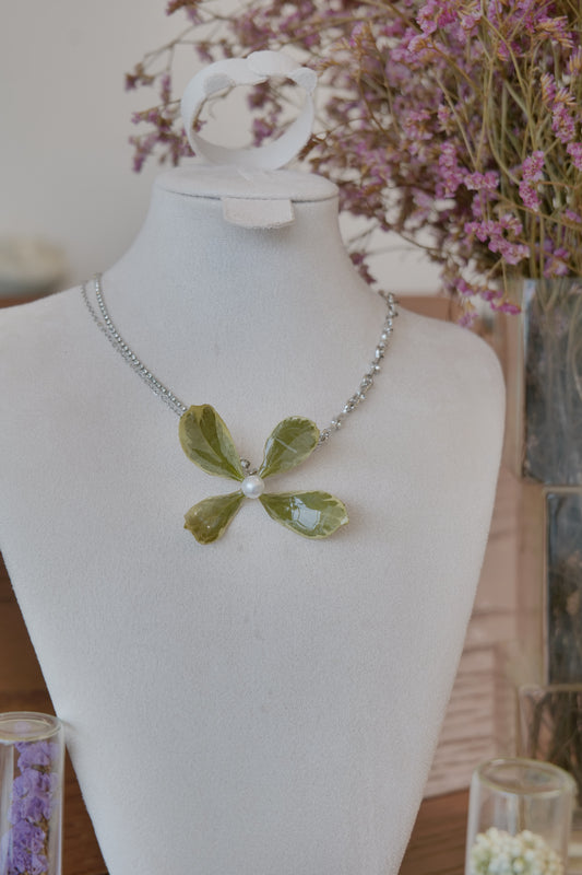 front view of Golden Edge Euonymus leaf floral pendant necklace, handmade botanical jewellery by Terra Decode