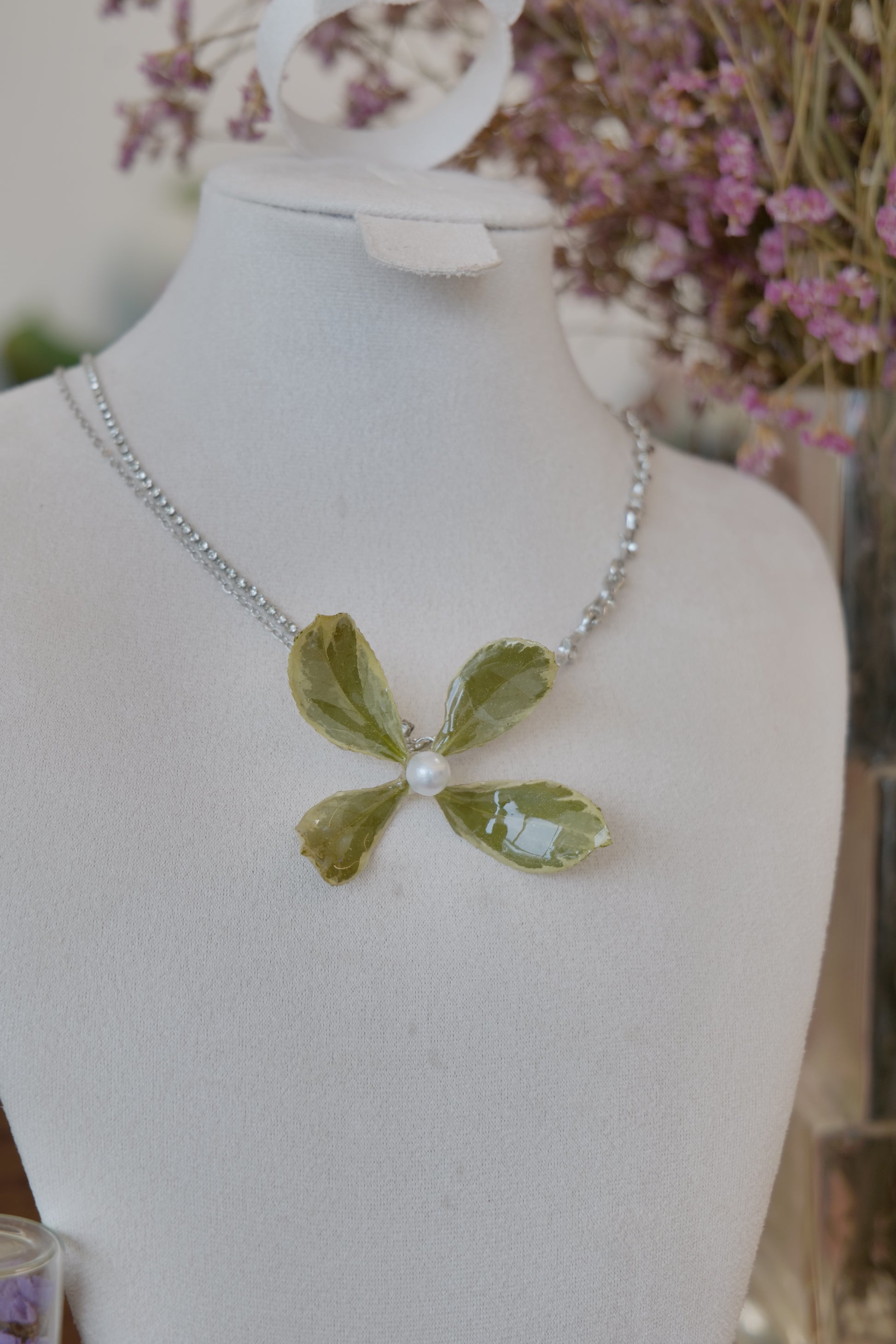 flower close-up of Golden Edge Euonymus leaf floral pendant necklace, handmade botanical jewellery by Terra Decode