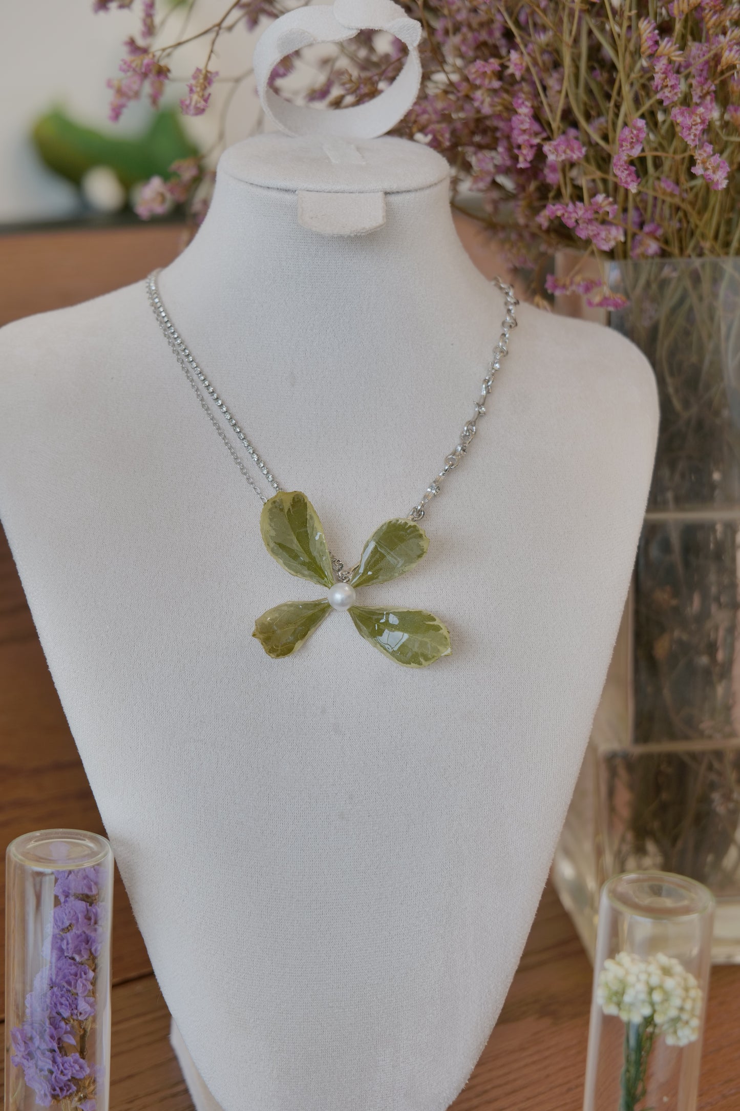 side view of Golden Edge Euonymus leaf floral pendant necklace, handmade botanical jewellery by Terra Decode