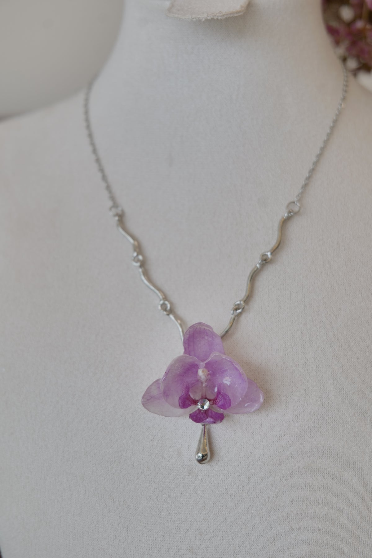 full product view of purple Phalaenopsis orchid charm necklace, handmade botanical jewellery by Terra Decode