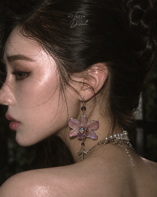 LIBELLA Pink Dendrobium Orchid Dragonfly & Iridescent Rhinestone Earrings worn by a model | Terra Decode