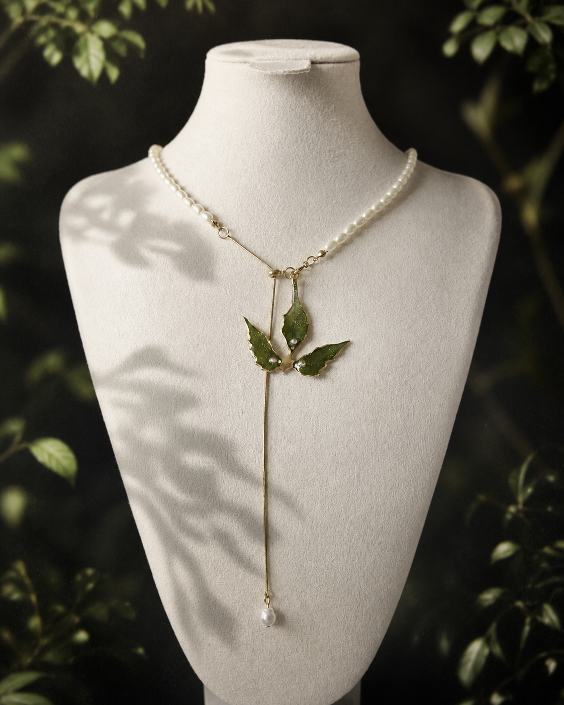 Close-up of real Boston ivy leaves preserved in clear resin, Boston Ivy Pearl-Drop Split-Chain Necklace botanical jewellery by Terra Decode