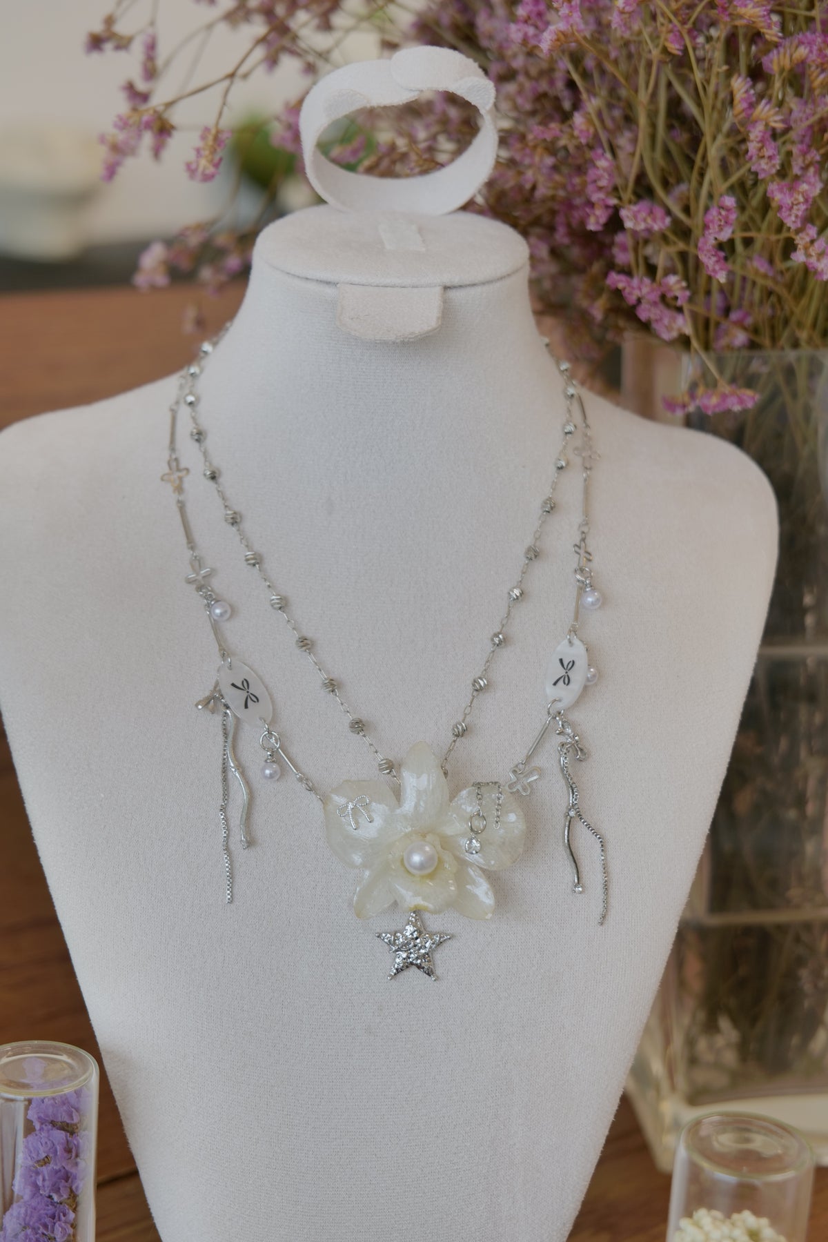 full product view of cream Dendrobium orchid pearl necklace, handmade botanical jewellery by Terra Decode