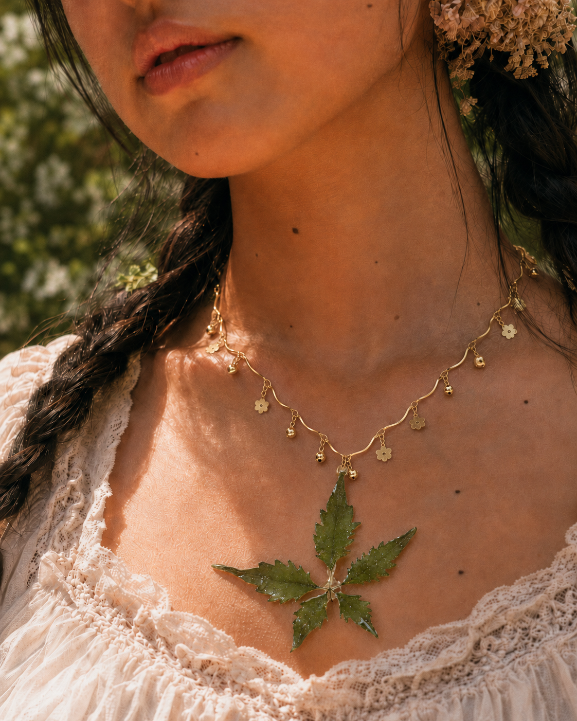 Model wearing the Chinese Chaste Tree Floral-Chain Necklace by Terra Decode