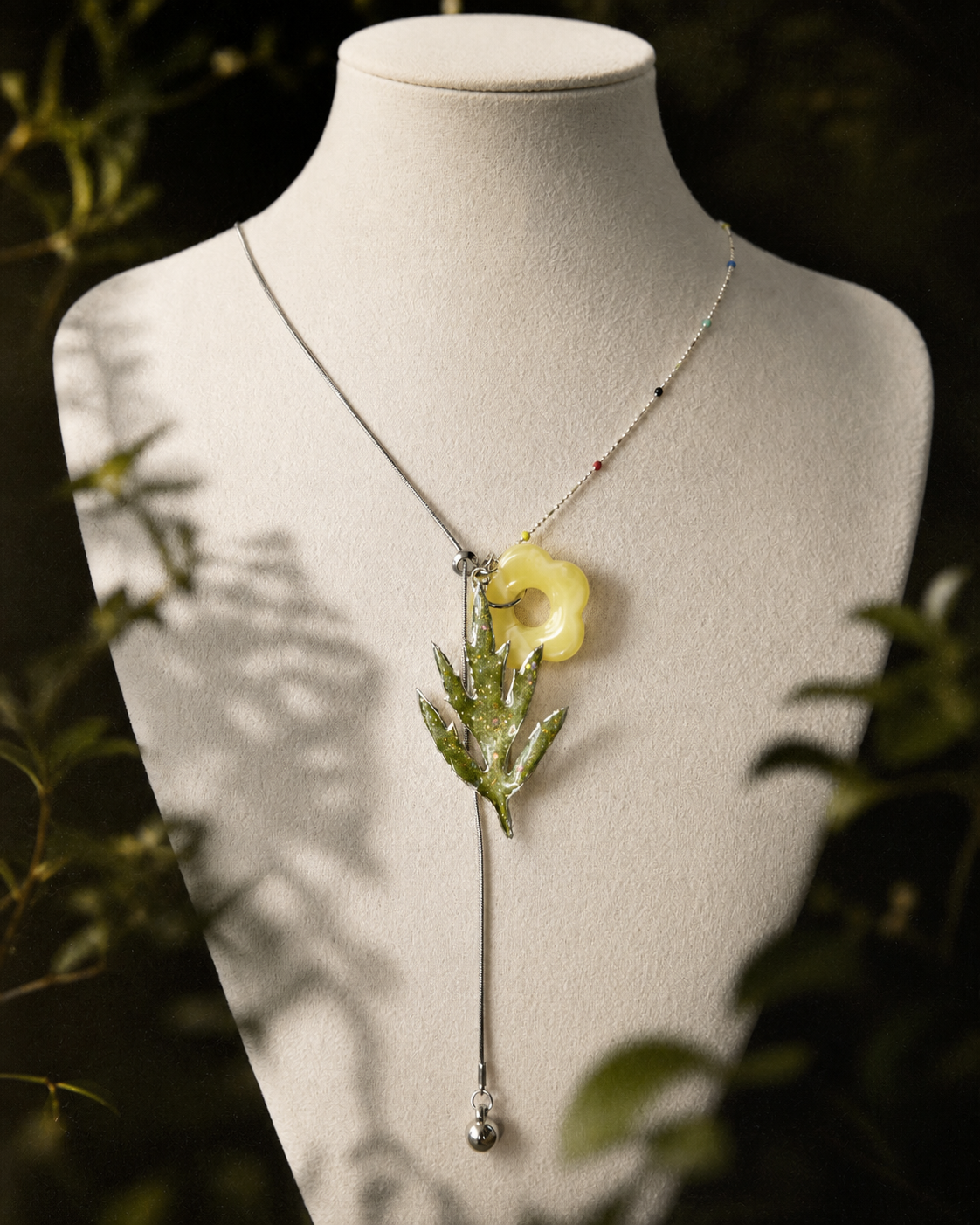 Angled view of preserved Chinese mugwort and silver-toned mixed chain, Chinese Mugwort Botanical Mixed-Chain Necklace botanical jewellery by Terra Decode