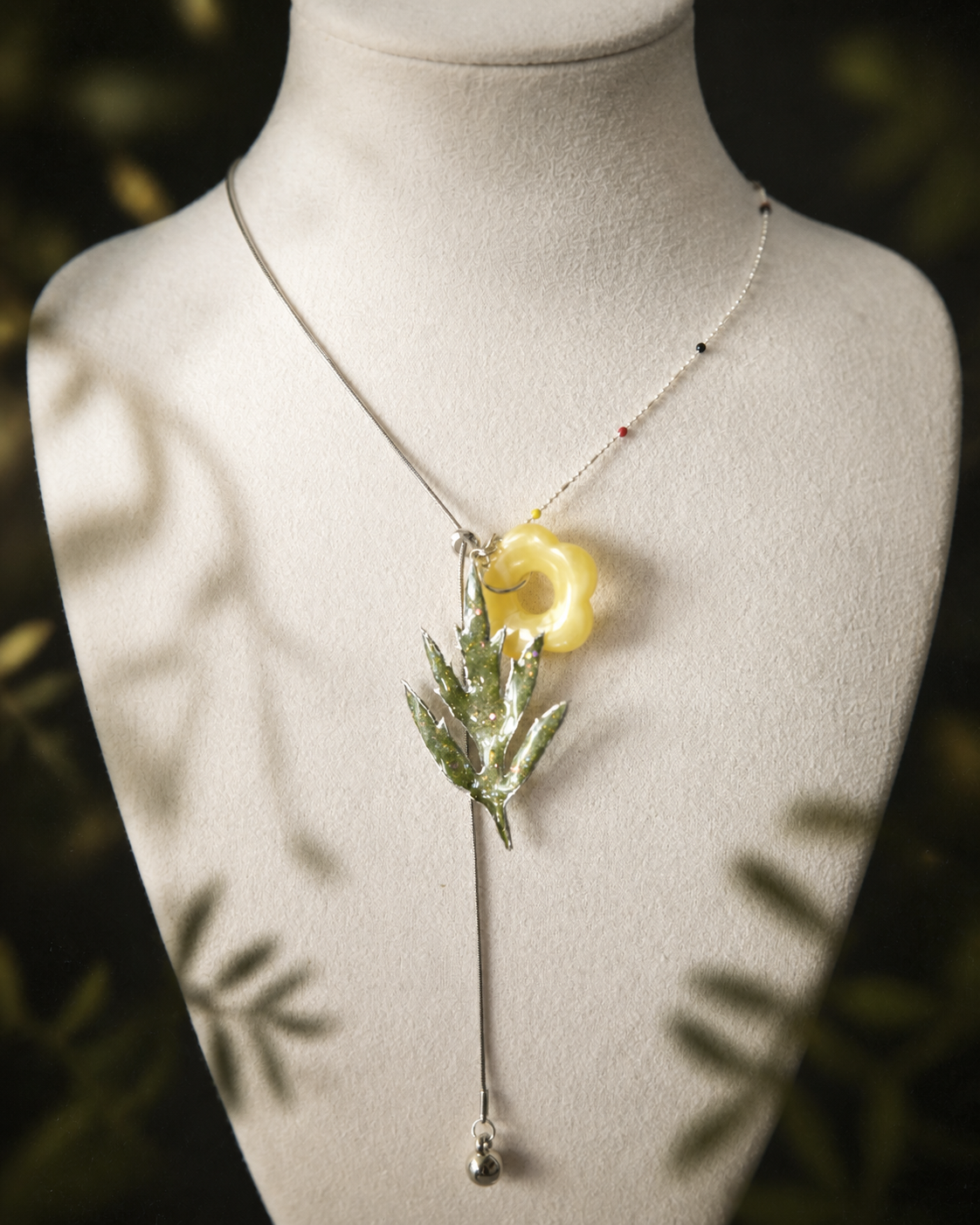 Metal drop detail below the Chinese mugwort botanical pendant, Chinese Mugwort Botanical Mixed-Chain Necklace botanical jewellery by Terra Decode