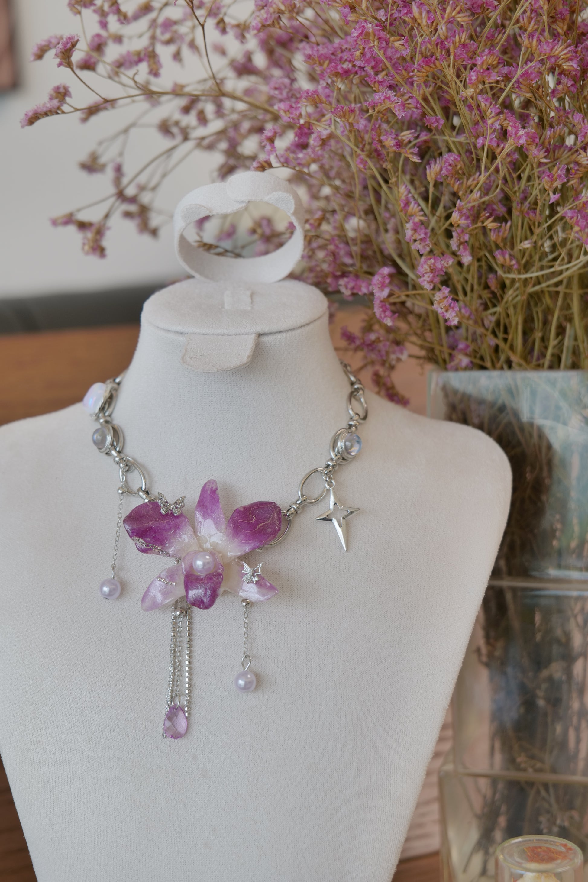 flower close-up of purple Dendrobium orchid pearl charm choker necklace, handmade botanical jewellery by Terra Decode