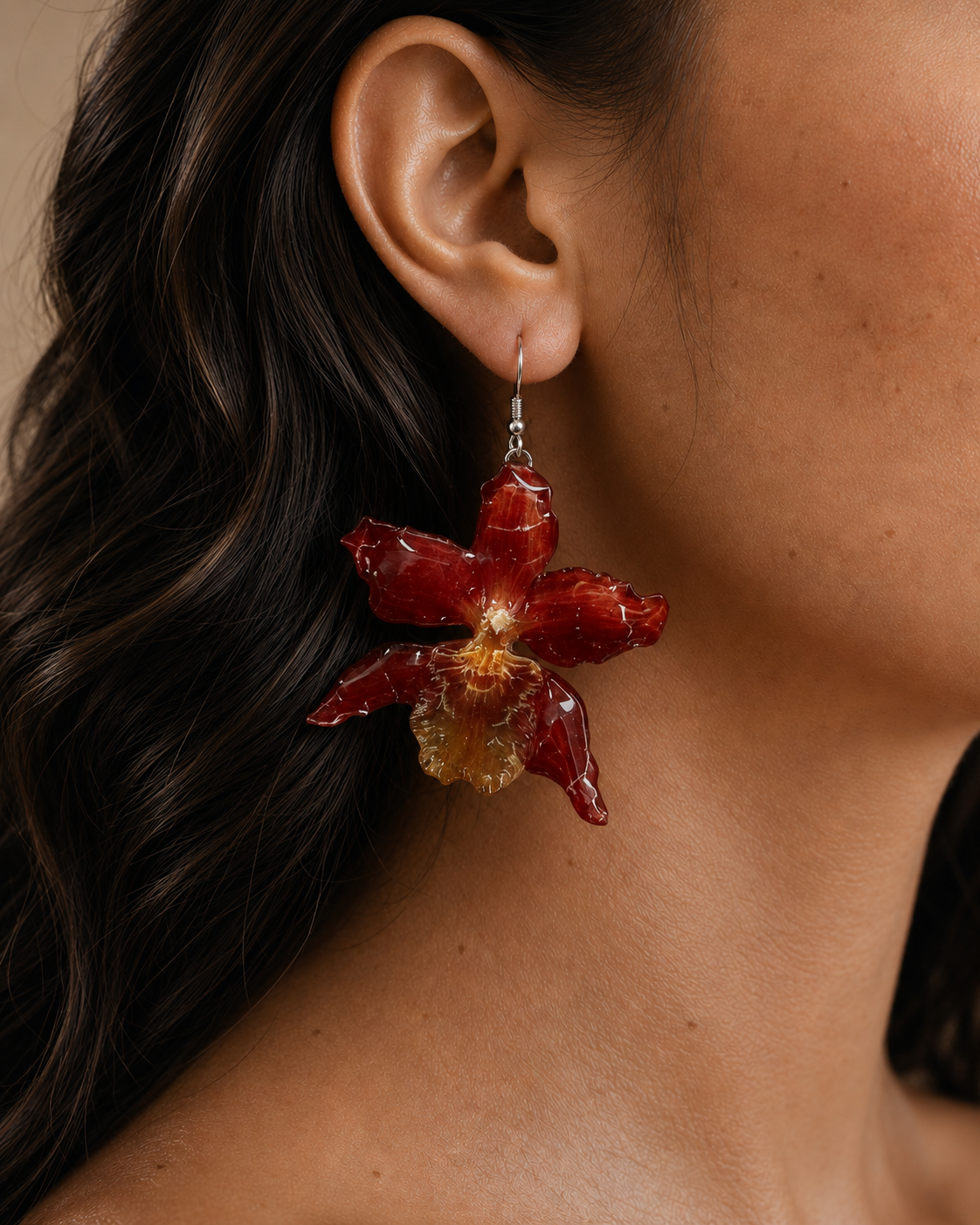 Model wearing crimson orchid drop earrings with preserved resin petals, Crimson Orchid Drop Earrings botanical jewellery by Terra Decode