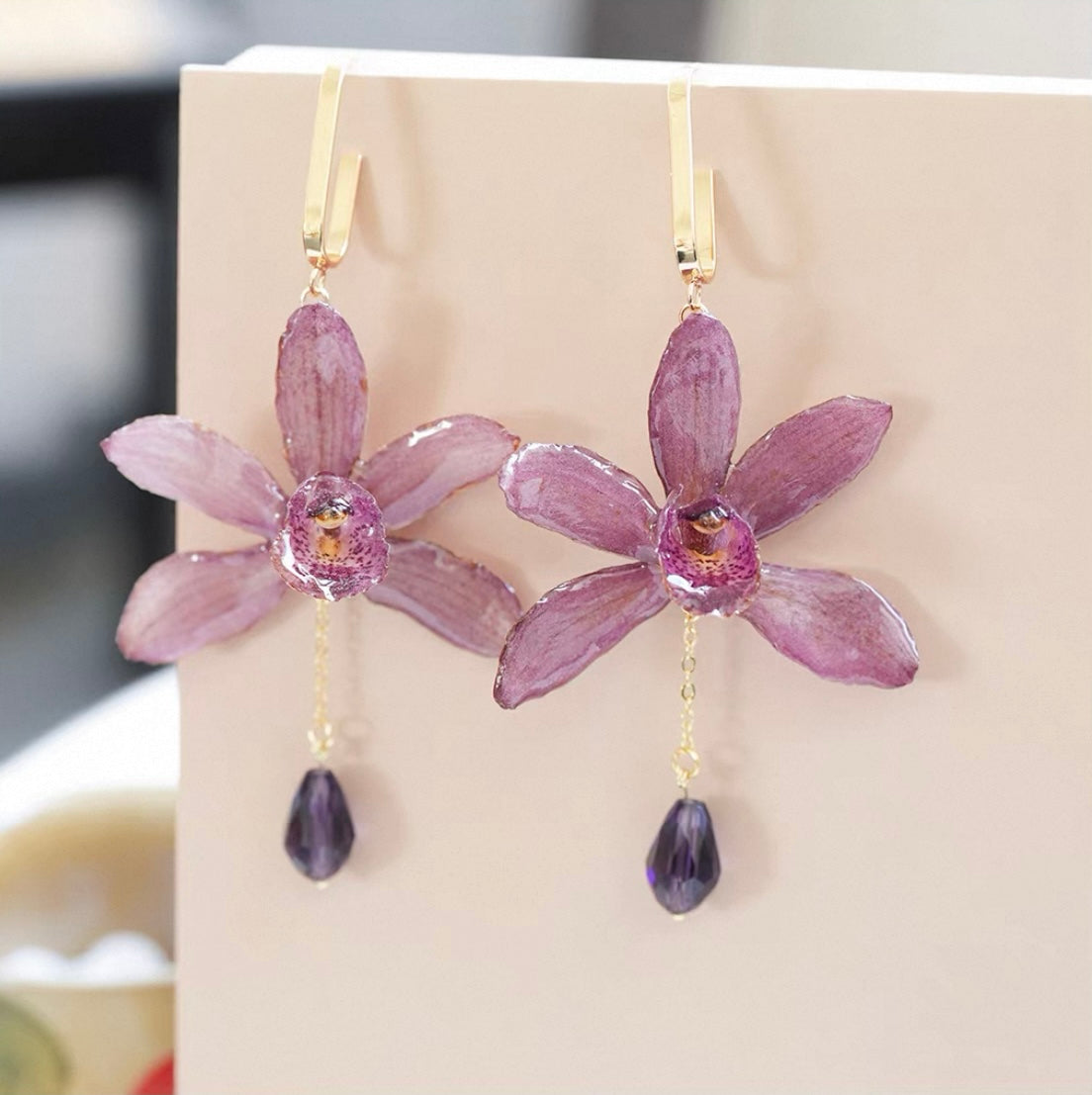 Soft Purple cymbidium orchid earrings with resin petals and purple bead drops by Terra Decode