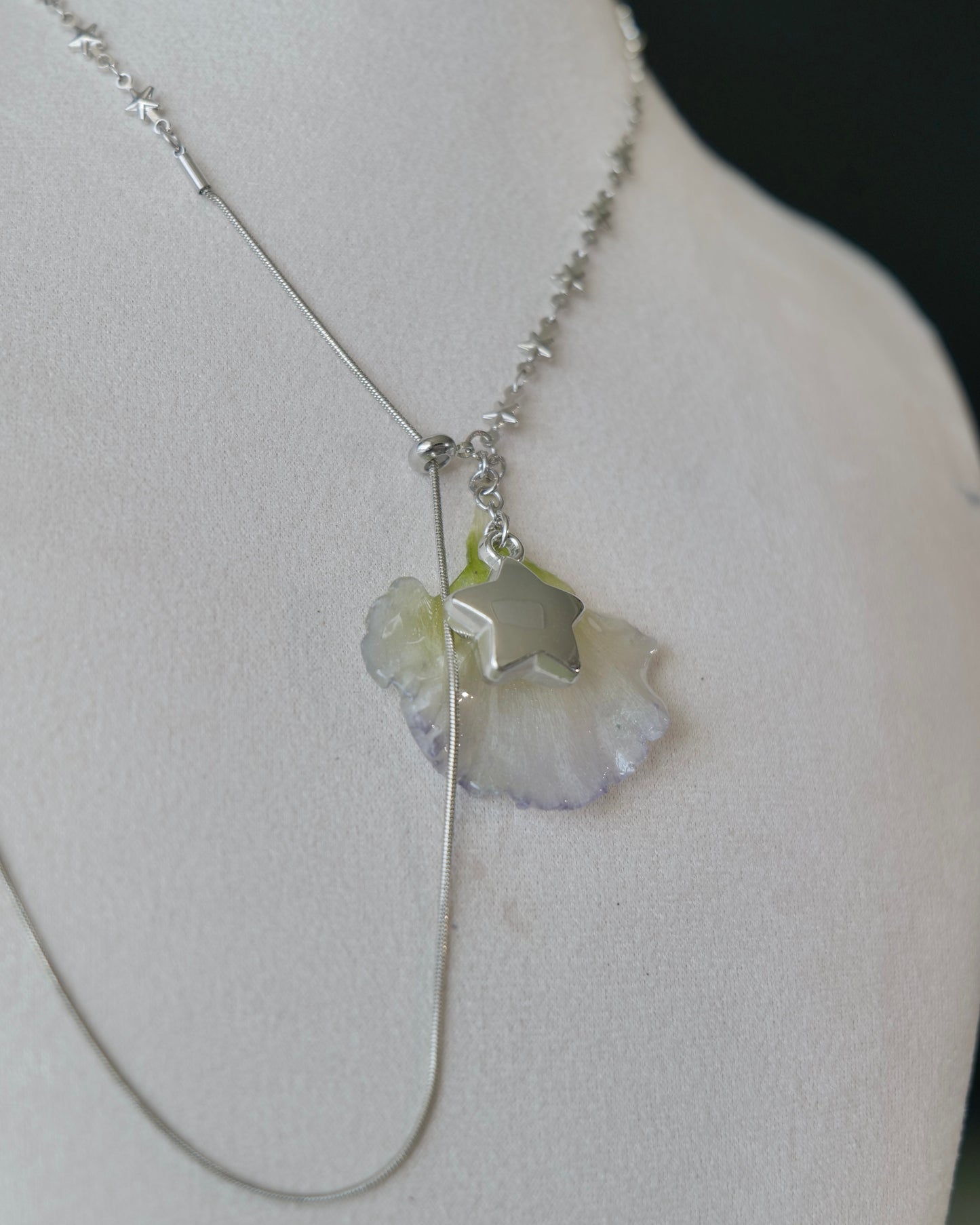 Side angle of double-lisianthus pendant with adjustable chain loop