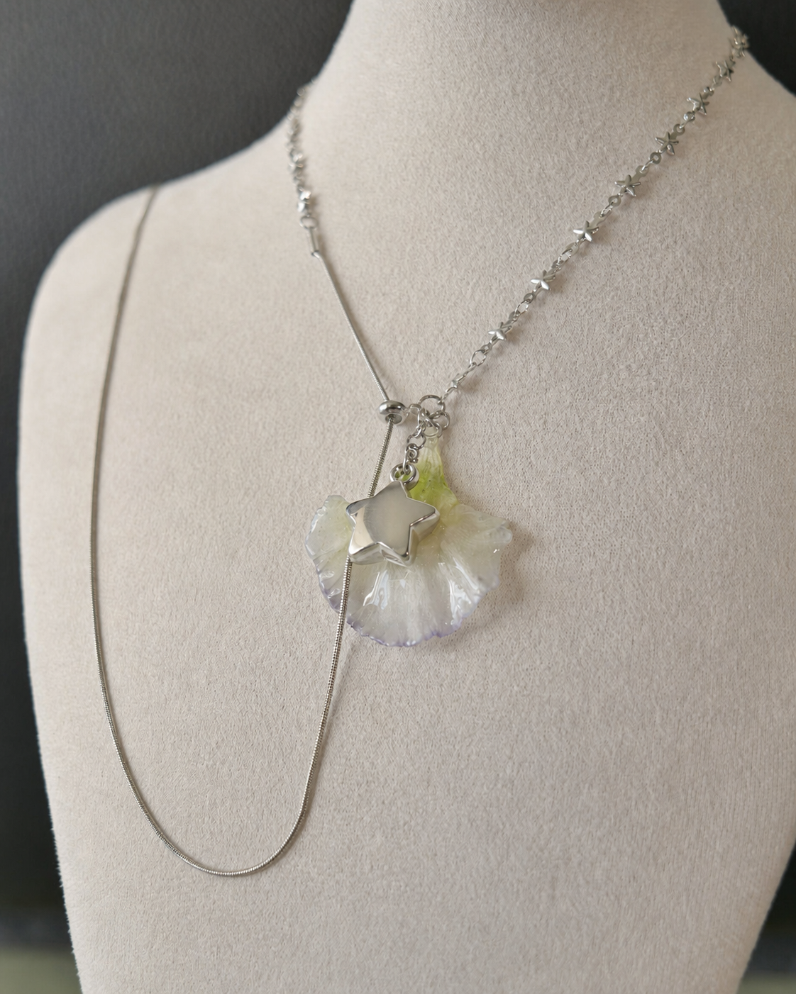 Full display view showing the asymmetric star links and sliding lariat construction, Double Lisianthus Star Adjustable Lariat Necklace botanical jewellery by Terra Decode