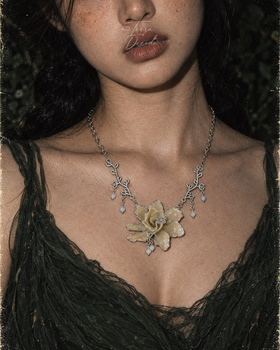 ELOISE Gardenia Silver Bead Dangle Charm Necklace worn by a model | Terra Decode