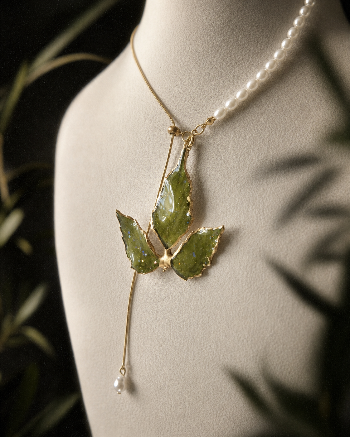 Full-length view of the gold-edged leaf necklace and pearl drop, Gold-Edged Boston Ivy Pearl-Drop Necklace botanical jewellery by Terra Decode