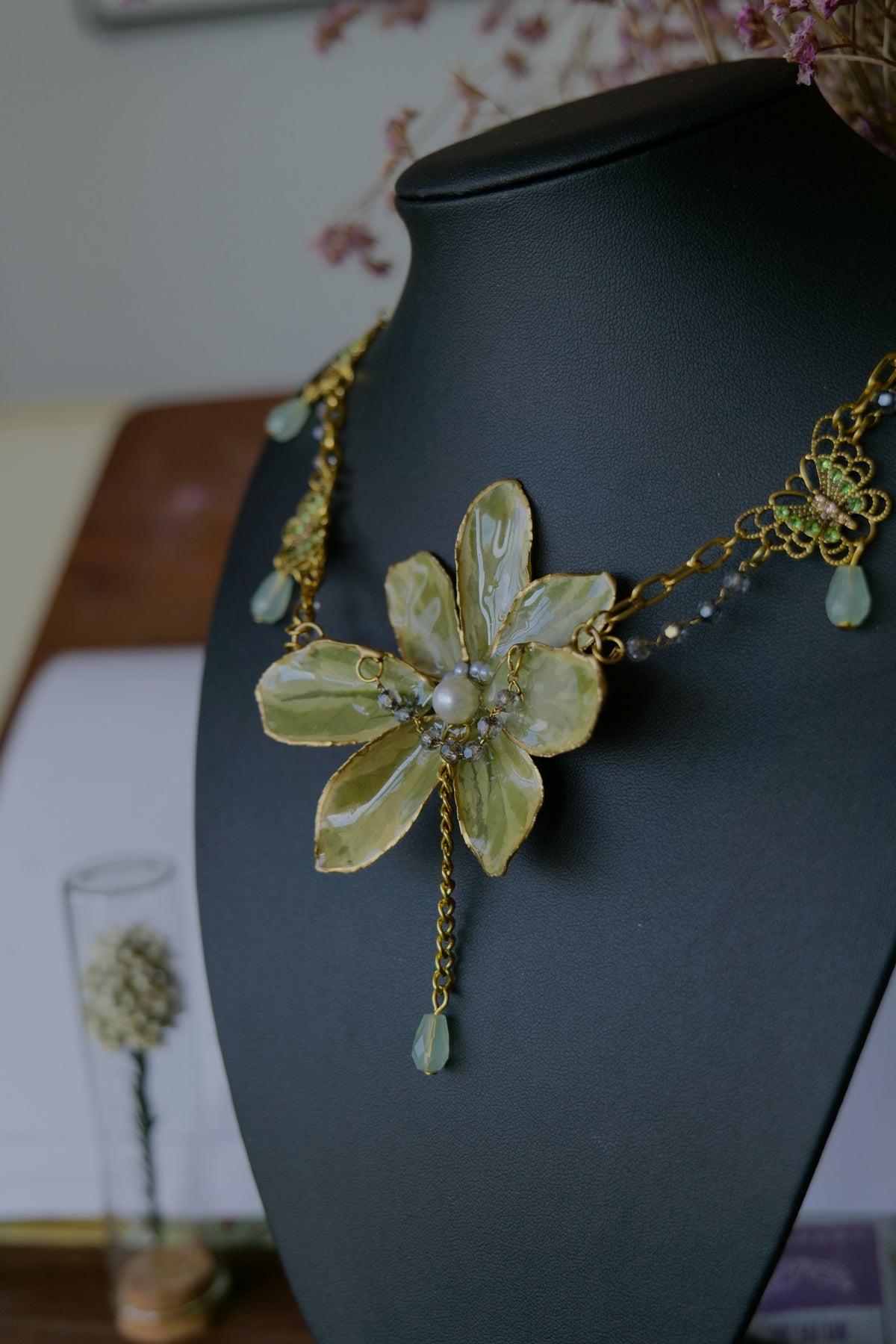 Full view of the one-of-a-kind golden-edge Euonymus statement necklace