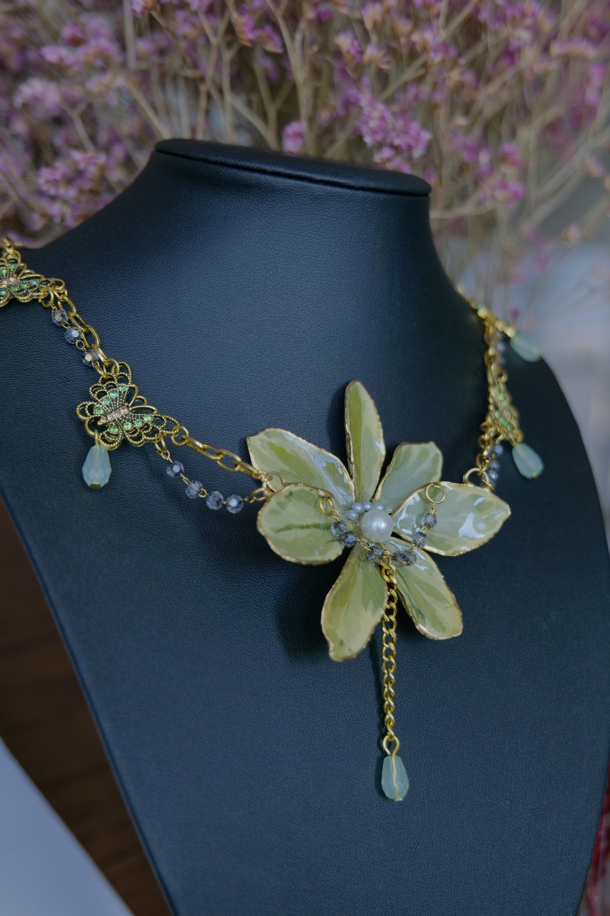 Back and fastening detail of the handmade Euonymus botanical necklace