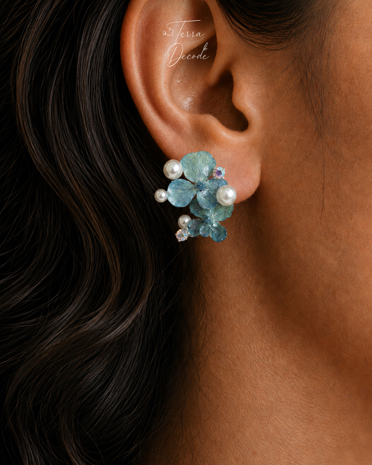 Blue hydrangea pearl cluster stud earring worn on ear