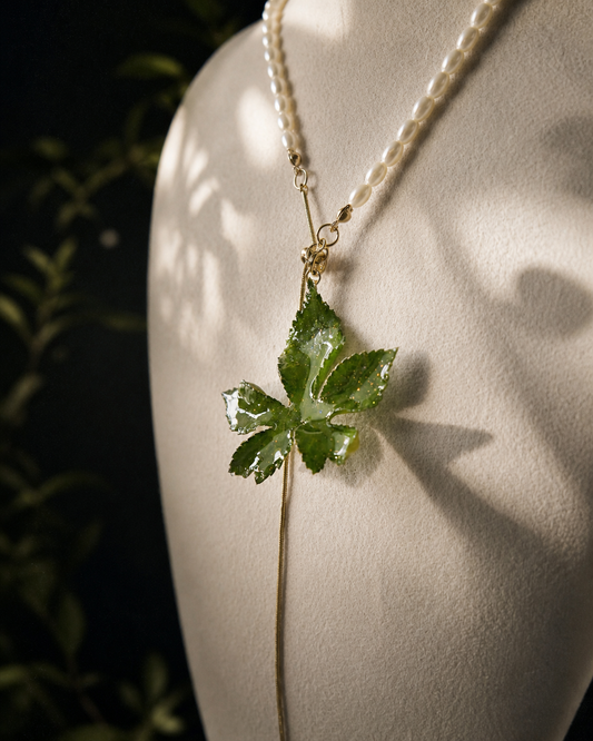 Close-up of Japanese hop leaf veins preserved in clear resin, Japanese Hop Pearl-Drop Adjustable Lariat Necklace botanical jewellery by Terra Decode