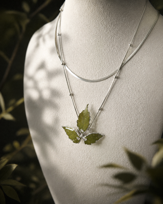 Close-up of Boston ivy leaves preserved in clear resin, Layered Silver Boston Ivy Botanical Necklace botanical jewellery by Terra Decode