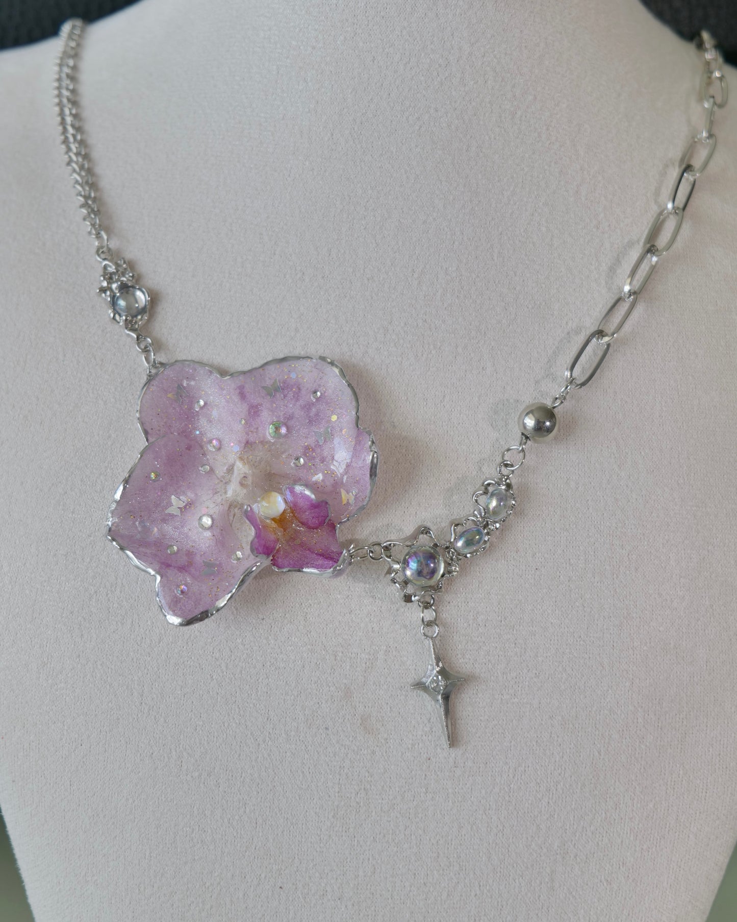 Additional front view of lilac Phalaenopsis necklace with mixed silver-toned chains