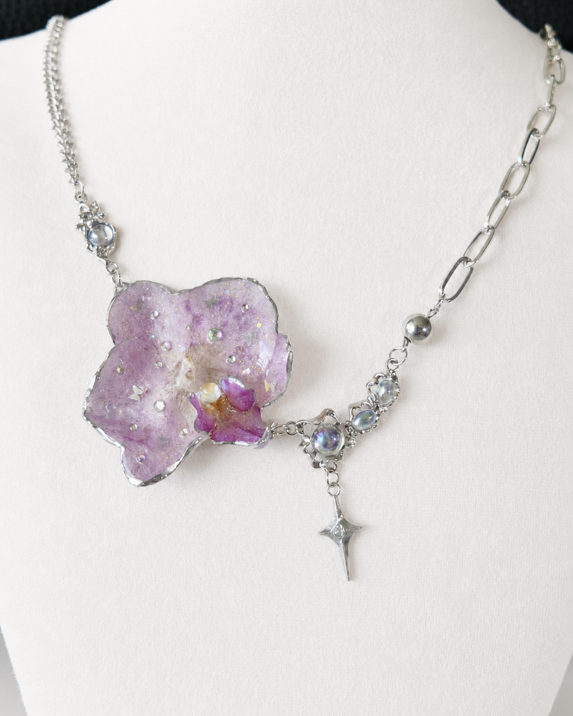 Front display view of the Lilac Phalaenopsis Moonstone-Style Star-Drop Necklace, Lilac Phalaenopsis Moonstone-Style Star-Drop Necklace botanical jewellery by Terra Decode