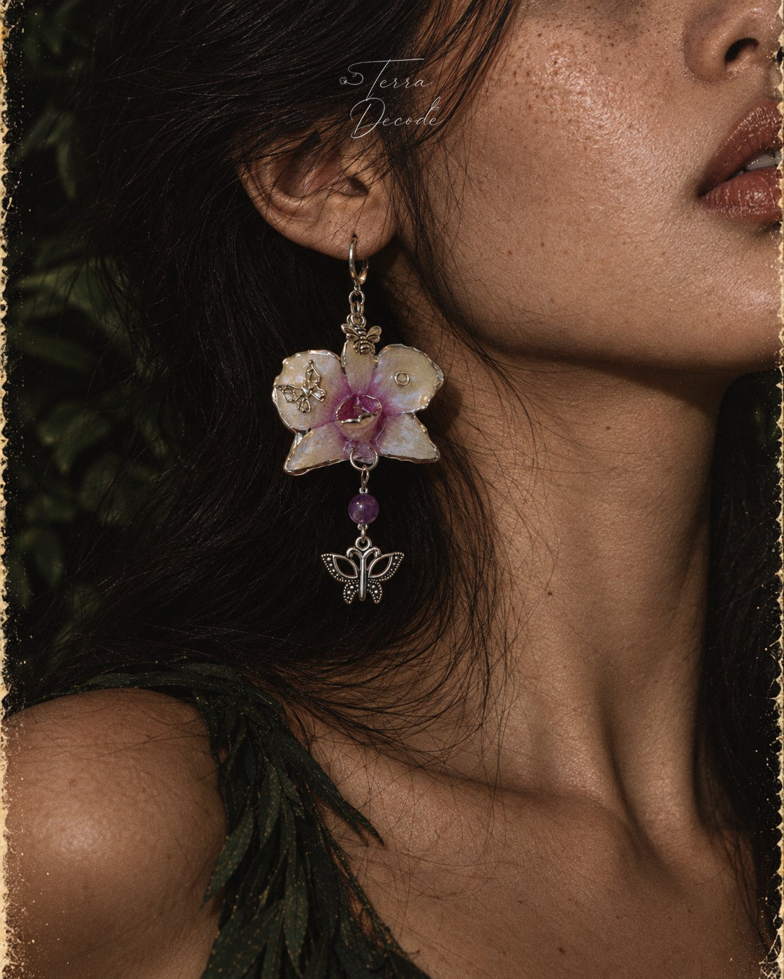 LUNARIA Asymmetric Dendrobium Butterfly and Bee Earrings worn by a model | Terra Decode