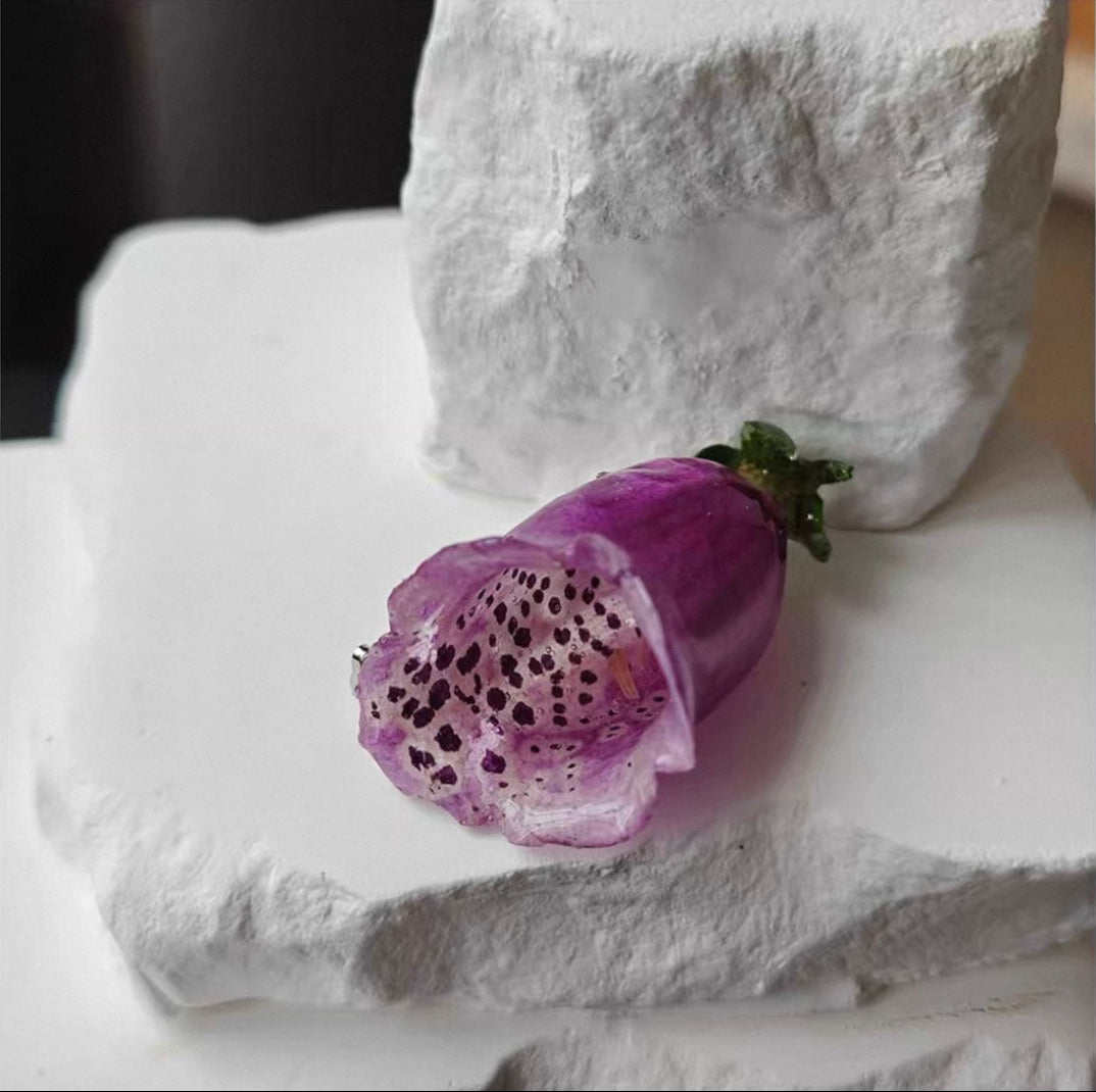 Speckled purple orchid brooch with resin petals and preserved botanical texture by Terra Decode