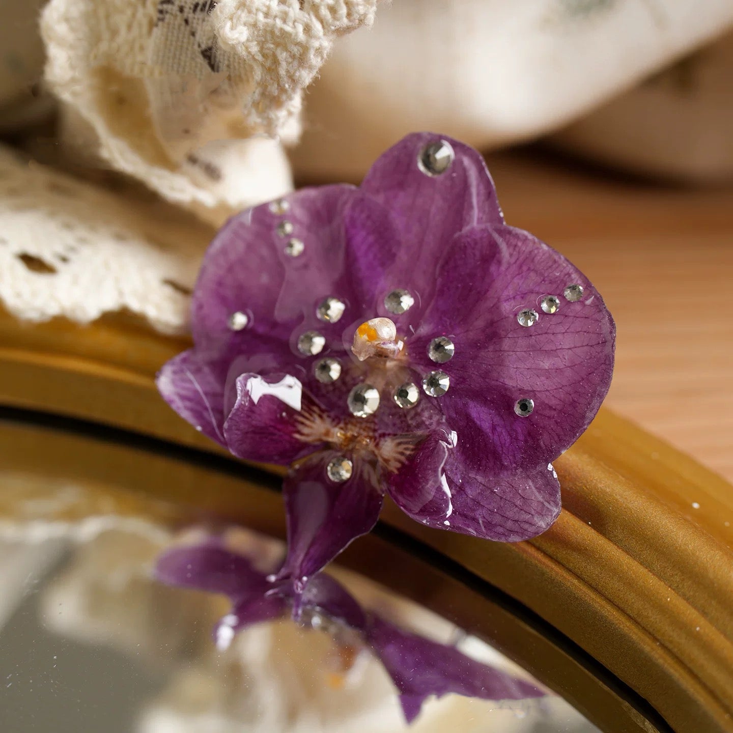 Deep Plum orchid brooch with resin petals and decorative bead accents by Terra Decode