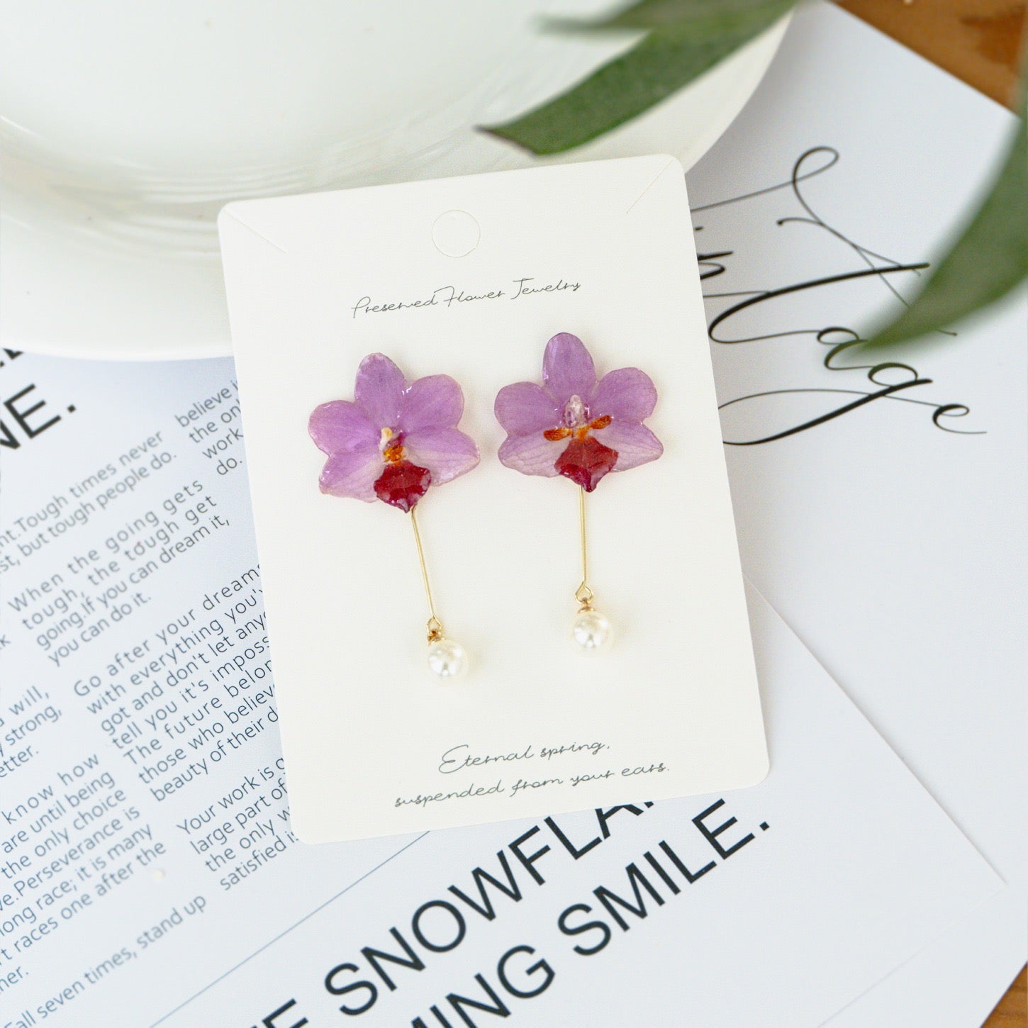 Soft Pink orchid earrings with resin petals and pearl-like drop by Terra Decode