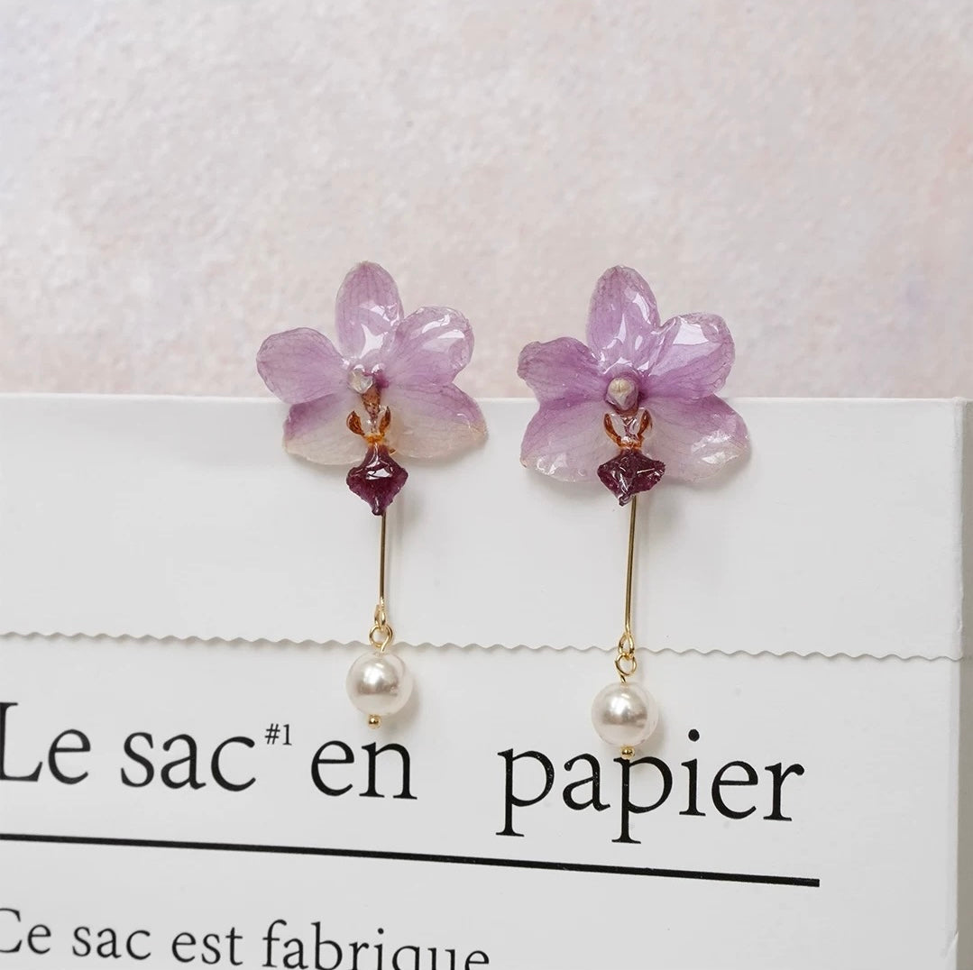 Lavender Purple orchid earrings with resin petals and pearl-like drop by Terra Decode