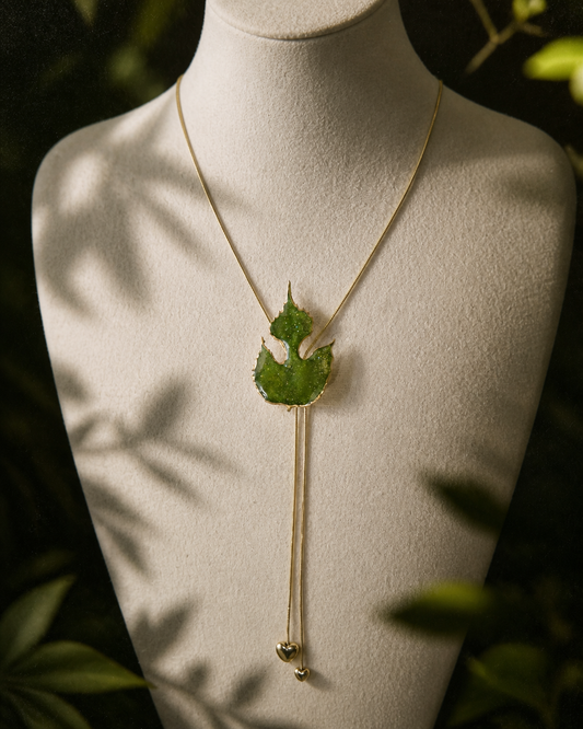 Close-up of paper mulberry leaves preserved in clear resin, Paper Mulberry Double-Heart Lariat Necklace botanical jewellery by Terra Decode