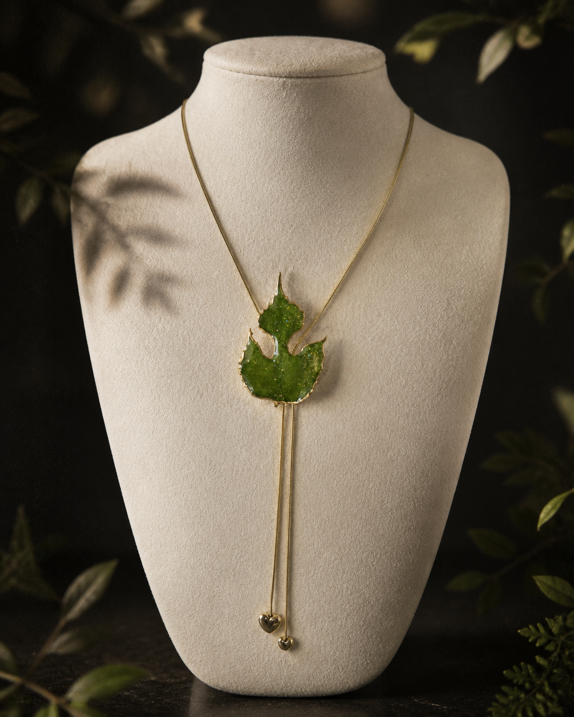 Full-length view of the botanical lariat necklace and hanging chains, Paper Mulberry Double-Heart Lariat Necklace botanical jewellery by Terra Decode