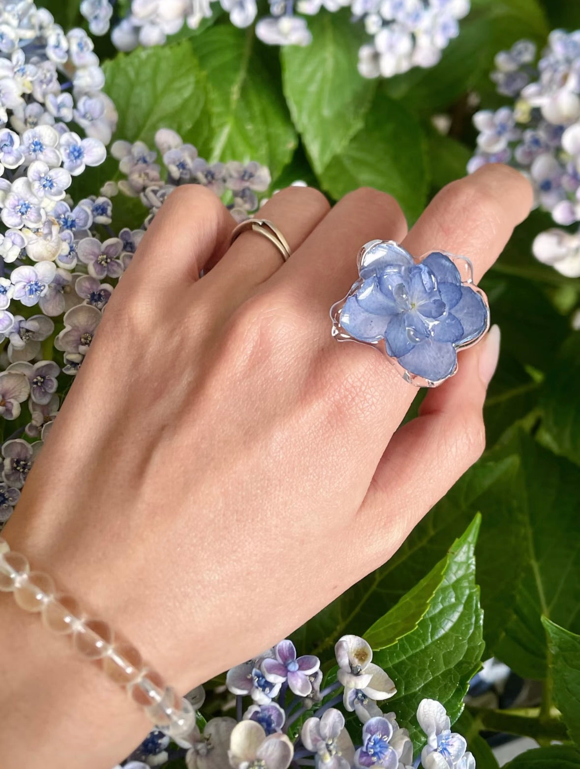 Hydrangea Blue hydrangea ring with translucent resin petals and adjustable metal band by Terra Decode