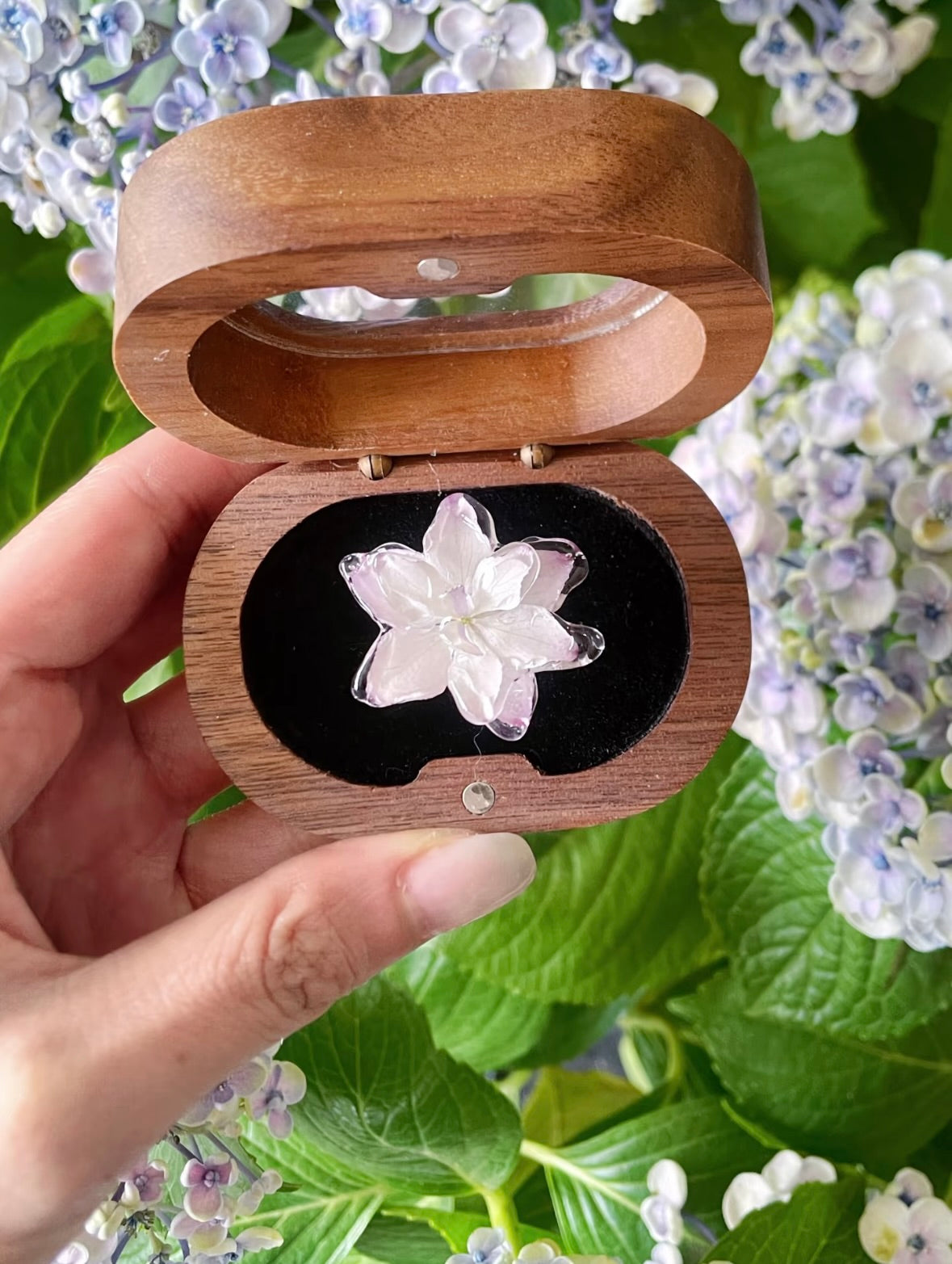 Cream White hydrangea ring with translucent resin petals and adjustable metal band by Terra Decode
