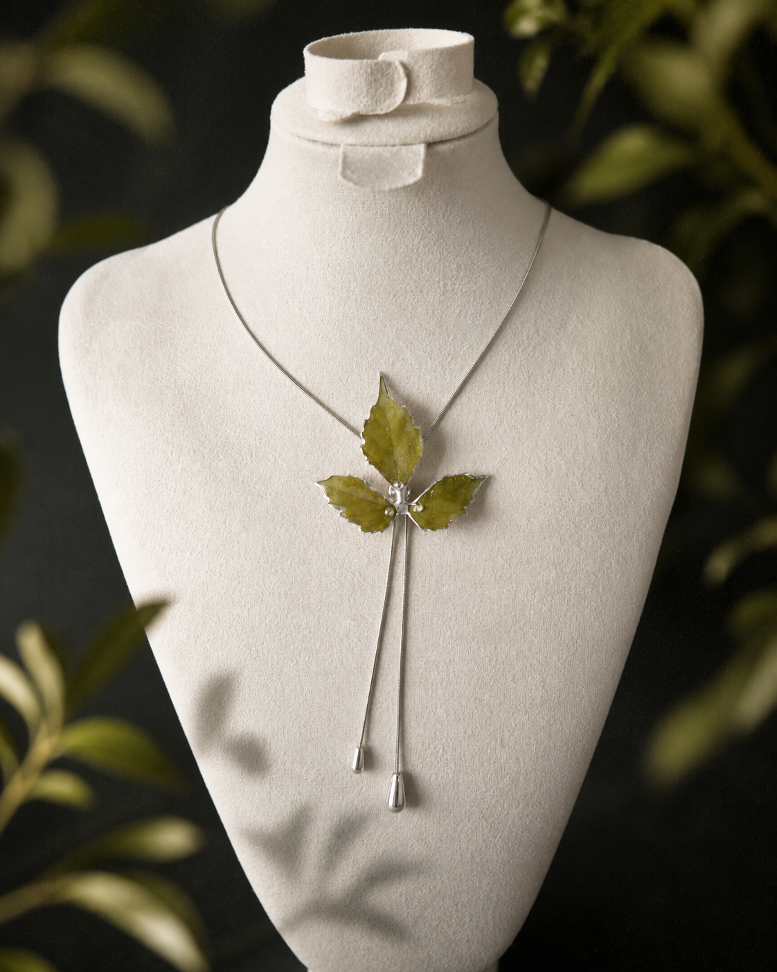 Left angled view of the real Boston ivy pendant and silver-toned lariat, Silver-Toned Boston Ivy Twin-Drop Lariat Necklace botanical jewellery by Terra Decode