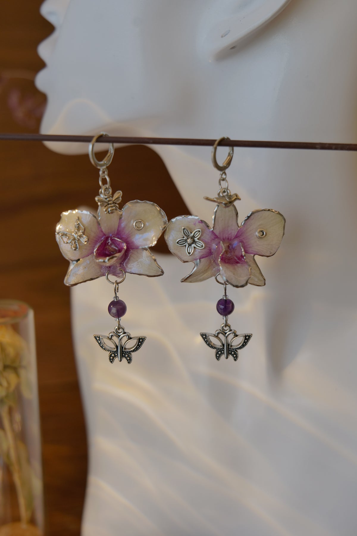 LUNARIA — Asymmetric Dendrobium Butterfly & Bee Earrings by Terra Decode — product photograph 5 showing the handmade botanical earrings.