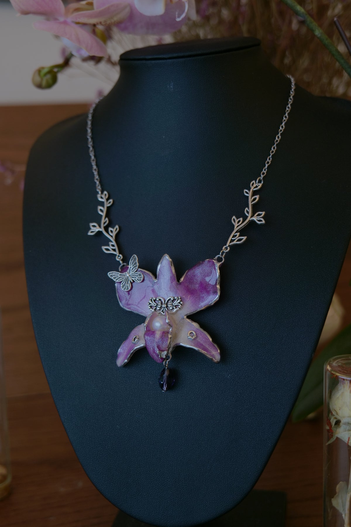 VIOLETTE — Purple Dendrobium Butterfly Branch Pendant Necklace by Terra Decode — product photograph 1 showing the handmade necklace and botanical details.