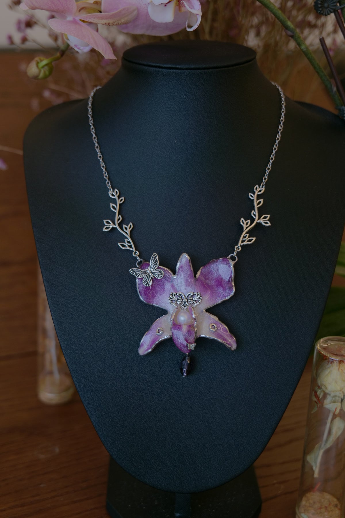 VIOLETTE — Purple Dendrobium Butterfly Branch Pendant Necklace by Terra Decode — product photograph 2 showing the handmade necklace and botanical details.