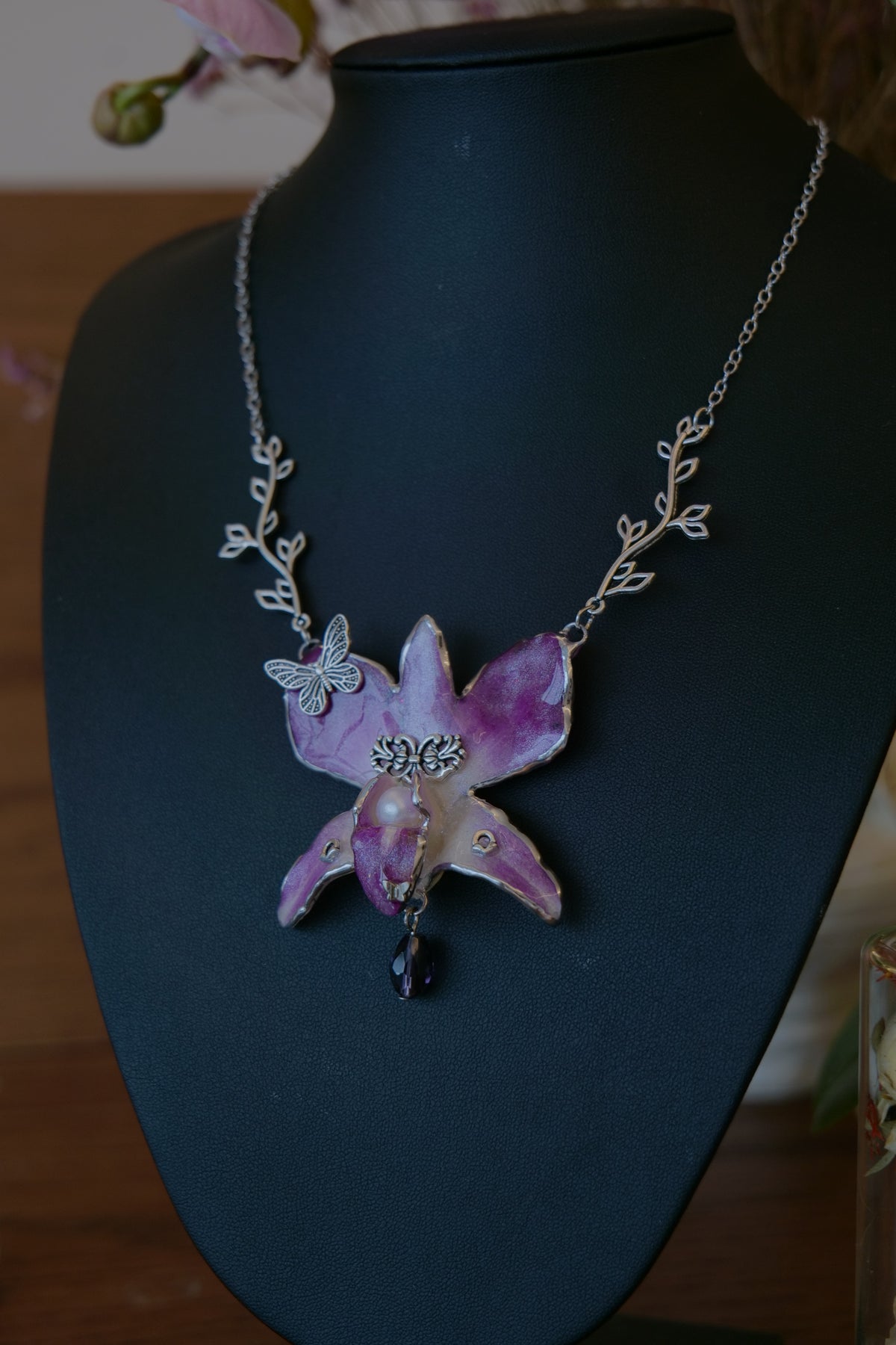 VIOLETTE — Purple Dendrobium Butterfly Branch Pendant Necklace by Terra Decode — product photograph 3 showing the handmade necklace and botanical details.