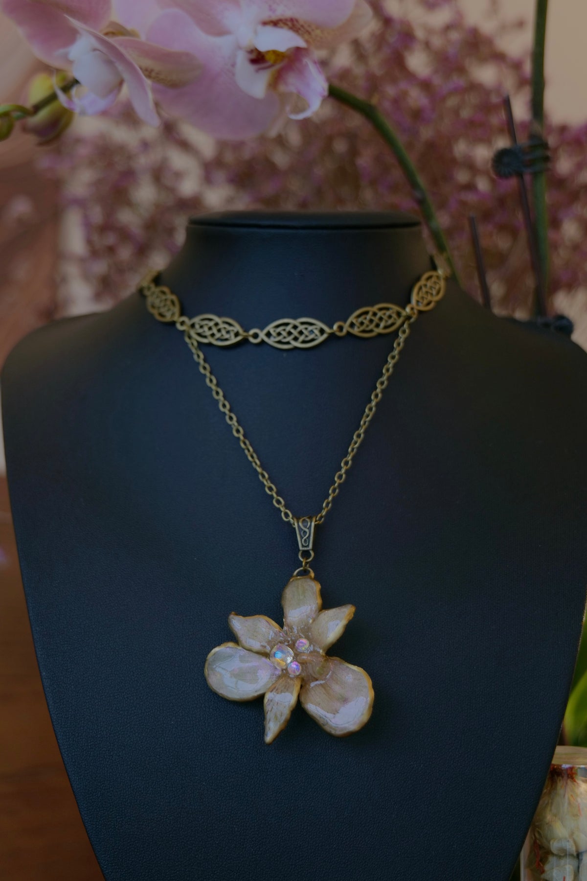 BRIGID — Celtic Peruvian Lily Iridescent Rhinestone Necklace by Terra Decode — product photograph 2 showing the handmade botanical necklace.