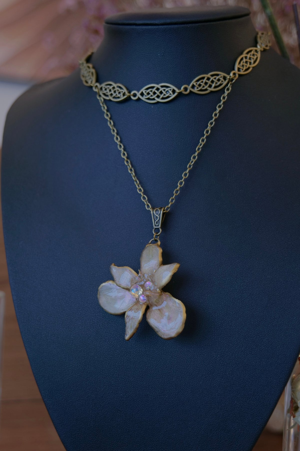 BRIGID — Celtic Peruvian Lily Iridescent Rhinestone Necklace by Terra Decode — product photograph 3 showing the handmade botanical necklace.