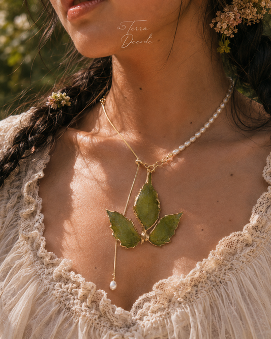 Boston ivy necklace with gold-toned leaf edging, imitation-pearl half-chain and pearl drop