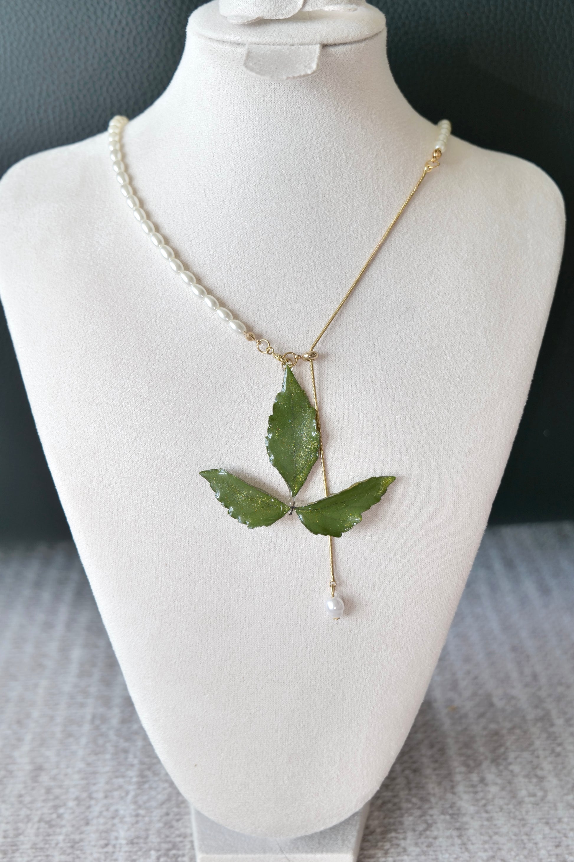 Close-up of Boston ivy leaves suspended in clear resin